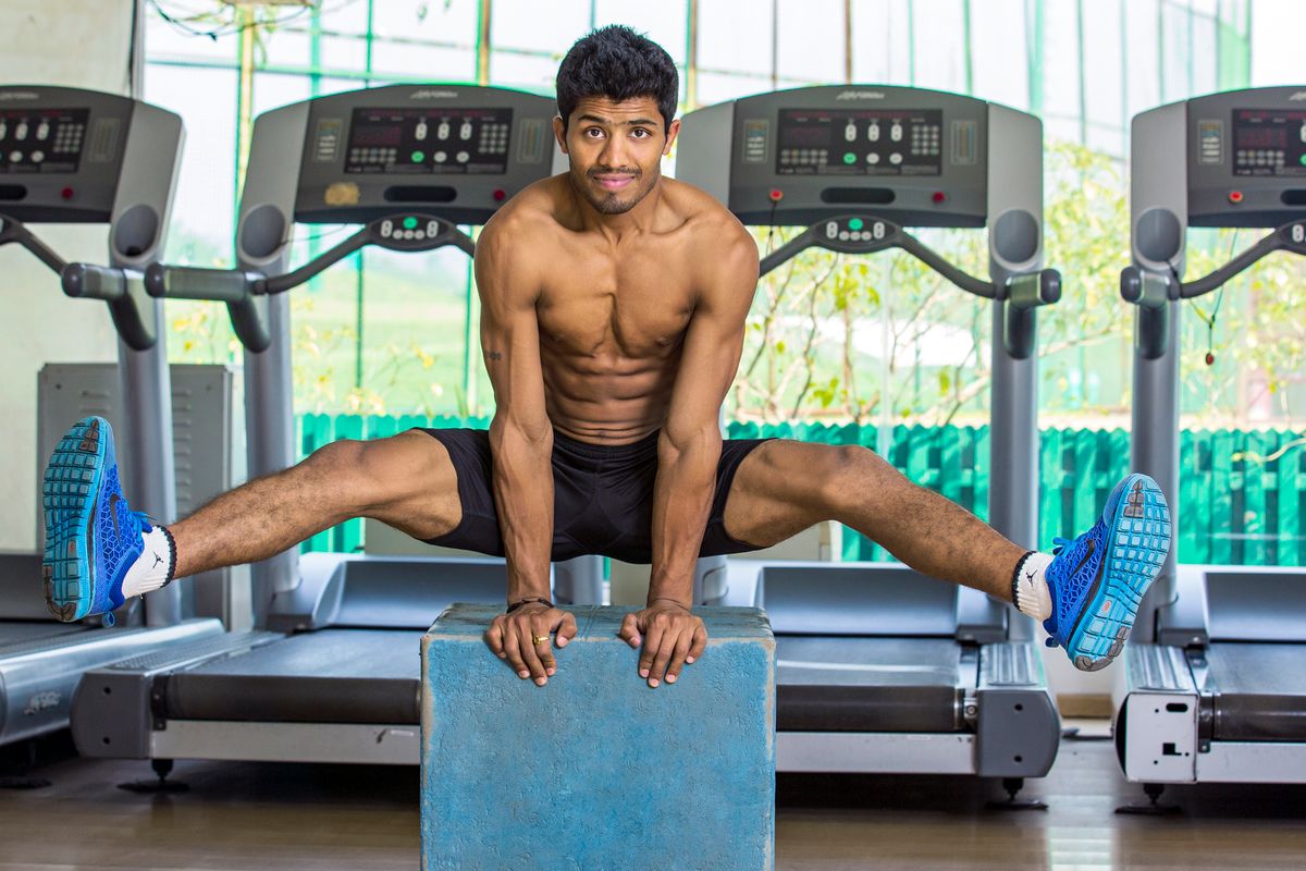 Indian athlete doing a calisthenics hold
